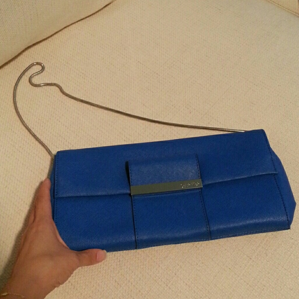Calvin Klein evening cluch with shoulder chain.